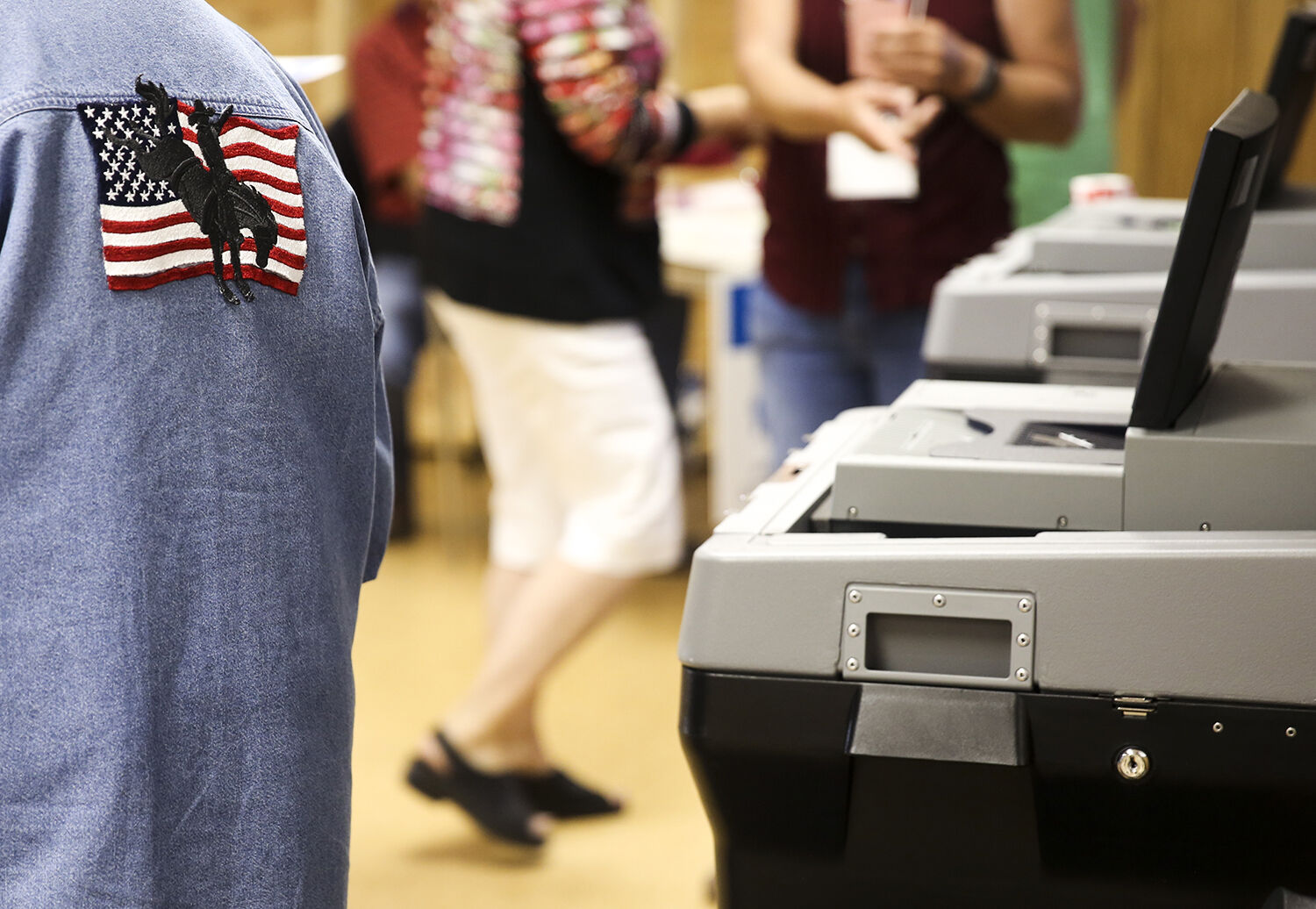 Nancy Barfield modified her shirt with an embroidered American flag and silhouette